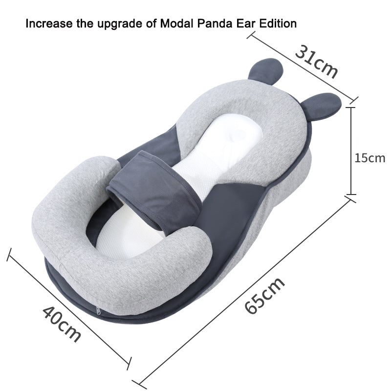 Breastfeeding artifact, nursing pillow, lying down